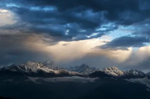 Clouds Prints: Ganesh Himal at sunrise, under dark sky. Seen from Cholangpati, Cholangpati, Langtang