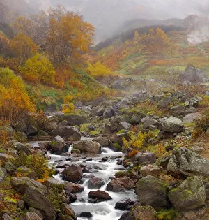 The Geyser River flows through the Valley of the Geysers, cloaked in autumn colours