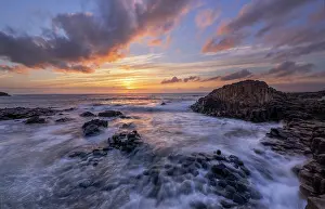 Giant's Causeway coast at sunset, Giant's Causeway, County Antrim, Northern Ireland, UK. August, 2024