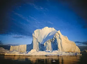 Iceberg against a blue sky. Ilulisat, West Greenland, summer
