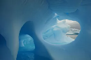 Iceberg Gallery: Icebergs with holes in the ice, Iceberg Alley, Pleneau Island, Antarctica