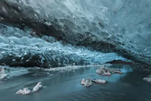 Inside an ice cave in the Vatnajokull Glacier, near Jokulsarlon, Iceland, March Inside an ice cave in the Vatnajokull Glacier, near Jokulsarlon, Iceland, March