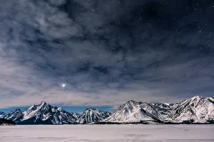 Christmas Prints: Jupiter setting over Mount Moran as a half moon illuminates the mountains and frozen lake below