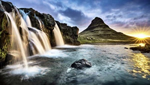 Images Dated 28th November 2016: Kirkjufellsfoss waterfall at sunrise, with Kirkjufell mountain in the background