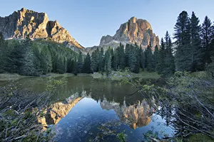 Lago Bain de Dones with Tofana de Rozes and Torri del Falzarego reflected, Dolomite Mountains