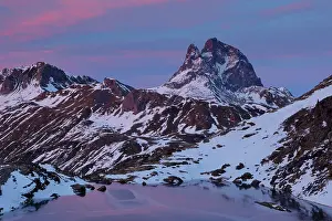 Summit Prints: Lake in snow-covered mountains at dusk