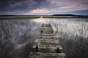 Images Dated 8th June 2008: Lake Usma viewed from a mooring stage on Moricsala Island with dark clouds, Moricsala