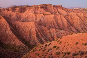 Landscape of Guadix geological depression within Los Colorados desert habitat. Guadix Depression, Andalusia, Spain. October