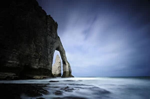 Landscape view of the Manneporte, a natural rock arch and needle, Etretat, Normandy