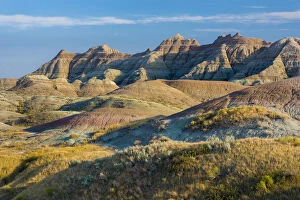 Late afternoon light warms the colors in the Yellow Mounds area, Badlands National Park