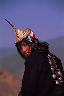Traditional Prints: Laya woman from West Bhutan wearing head-dress Bhutan Population approximately 800