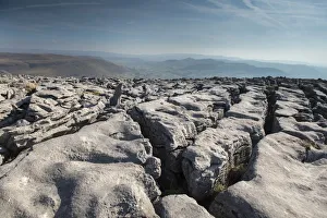Limestone Prints: A Limestone Pavement with well developed Clints (blocks) and Grykes (gaps)