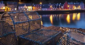 Images Dated 10th June 2011: Lobster pots on harbourside at night, Tobermory harbour, Isle of Mull, Scotland