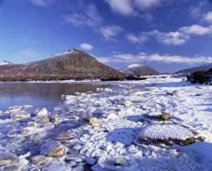 Images Dated 14th June 2010: Lough Shannagh with light covering of snow on the beach and Doan peak in the background