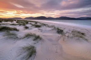 Luskentye beach at sunrise, mountains and incoming tide, Isle of Lewis and Harris Luskentye beach at sunrise, mountains and incoming tide, Isle of Lewis and Harris
