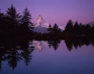 Matterhorn (4, 478m) with reflection in Grindji lake at sunrise, Wallis, Switzerland