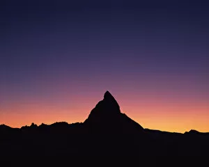 Matterhorn (4, 478m) silhouetted at sunset, viewed from Gornergrat, Wallis, Switzerland