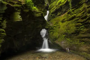 Merlins Well waterfall at St Nectans Glen, near Tintagel, North Cornwall, UK