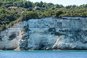 Greece Prints: The Messinian unconformity with sub-horizontal Miocene and Pliocene sediments overlying deformed Oligocene carbonates