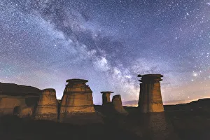 Milky-way over hoodoo rock formations in the Canadian badlands, Drumheller, Alberta, Canada