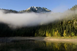 Mist over Black Lake with Big Bear peak in the distance, Durmitor NP, Montenegro