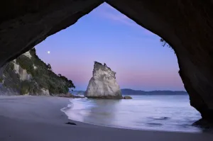 Images Dated 25th July 2012: Moon over Cathedral Cove at dawn, near Hahei, Coromandel Peninsula, North Island