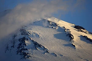 Mount Elbrus the highest mountain in Europe (5, 642m) surrounded by clouds seen