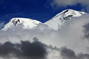 Images Dated 25th June 2008: Mount Elbrus, the highest mountain in Europe (5, 642m) surrounded by clouds, seen