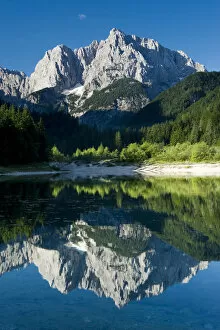 Images Dated 12th July 2009: Mount Prisojnik (2, 547m) with reflection in a small pond beside the river Pisnica