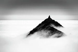 Mount Stapafell in mist (caused by with temperature inversion) Iceland. June