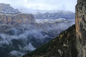 Mountain gorge filled with mist, Ordesa y Monte Perdido National Park, Huesca, Spain, October 2015