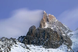 Images Dated 12th December 2011: Mountains in snow, Aiguille du Dru with snow blowing off from the top at night. Chamonix