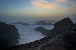 Mountains surrounded by low lying cloud, with a path on Pico do Arieiro, Madeira