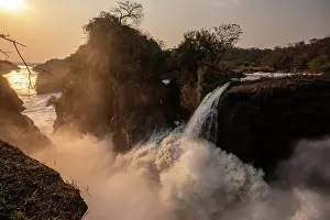 Waterfall Prints: Murchison Falls at sunset, Murchison Falls National Park
Uganda. February, 2023