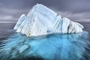 Natural ice sculpture floating at sea in Svalbard, Norway