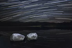 Images Dated 8th September 2015: Night sky over Loch Morlich with star trails, Cairngorms National Park, Cairngorms