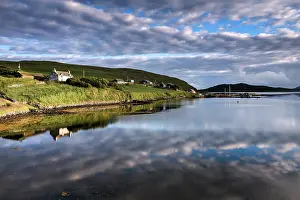 Reflection Prints: Noonsbrough village along water's edge with reflection of clouds