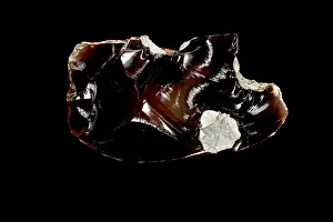 California Prints: Obsidia, an igneous rock that forms when molten rock material cools so rapidly that atoms are unable to arrange
