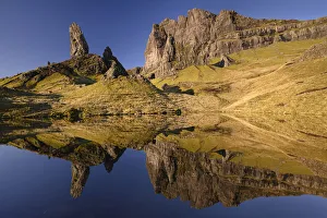 Inner Hebrides Prints: Old Man of Storr reflected in small lochan in morning light