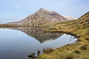 Pen yr Ole Wen reflected in Llyn Idwal in the Glyderau mountains in Snowdonia, North Wales