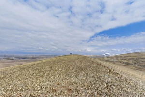 Images Dated 28th May 2020: Two people walking in vast landscape with dry grass Barguzin Valley, Buryatial, Siberia