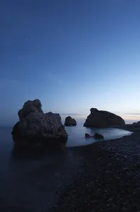 Images Dated 31st March 2009: Petra tou Romiou (Aphrodites Rock) at dusk, Pissouri Bay, near Paphos, Cyprus