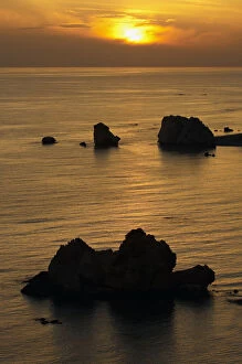 Petra tou Romiou (Aphrodites Rock) at sunset, Pissouri Bay, near Paphos, Cyprus