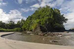 Playa Espadilla beach coastal landscape at the edge of Manuel Antonio National Park