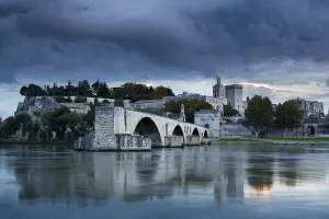 The Pont St-Benezet, Palais des Papes and Rhone River at dusk, Avignon, Provence