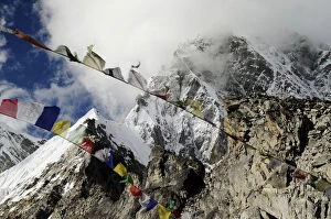 Mountains Collection: Prayer flags at Pumori Peak (7145 m) seen from Kala Pattar (5545 m), Sagarmatha National Park