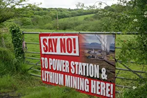 Environmental Issues Prints: Protest sign on gate in countryside against proposed lithium mining and power plant