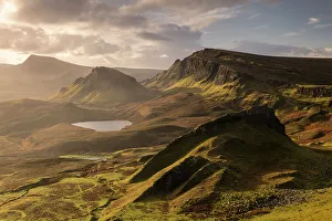 The Quiraing bathed in morning light, eastern face of Meall na Suiramach, the northernmost summit of the Trotternish on the Isle of Skye, Scotland, UK. November 2017