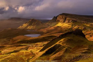 The Quiraing in golden morning light, eastern face of Meall na Suiramach