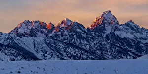 Western Usa Gallery: The last rays of sunset hit the Grand Teton and adjacent peaks on a winter evening